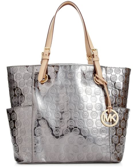 michael kors metallic purse recall|Michael Kors bag identification.